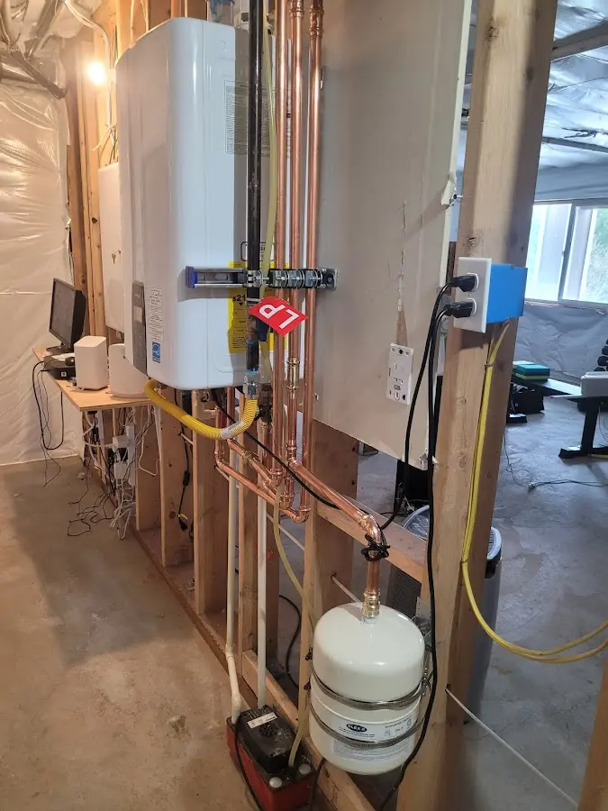 Licensed plumber repairing a kitchen sink in Affton